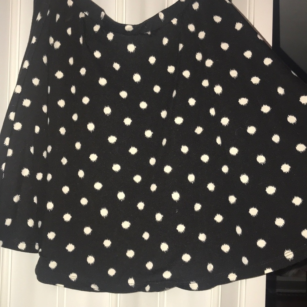 black skirt with white polka dots